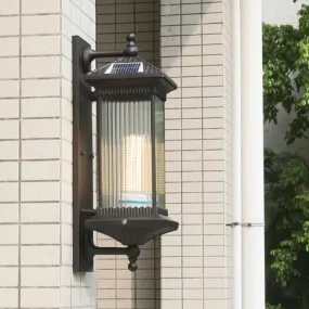 Traditional Glass LED Outdoor Wall Light with Solar Power and Ribbed Design.